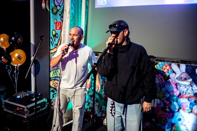 Two men rapping at the mic
